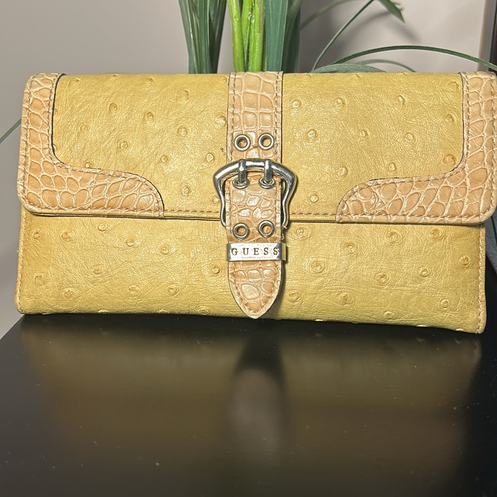 Women’s Guess leather wallet.